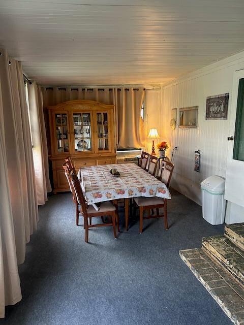 143 Southeast Easy Street Stuart, FL 34994 - Photo 5 of 12 a dining room with furniture and window