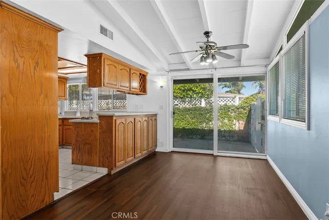 a kitchen with stainless steel appliances granite countertop a sink and cabinets