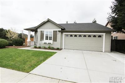 320 Burt Street Santa Rosa, CA 95404 - Photo 1 of 1 front view of a house with a yard