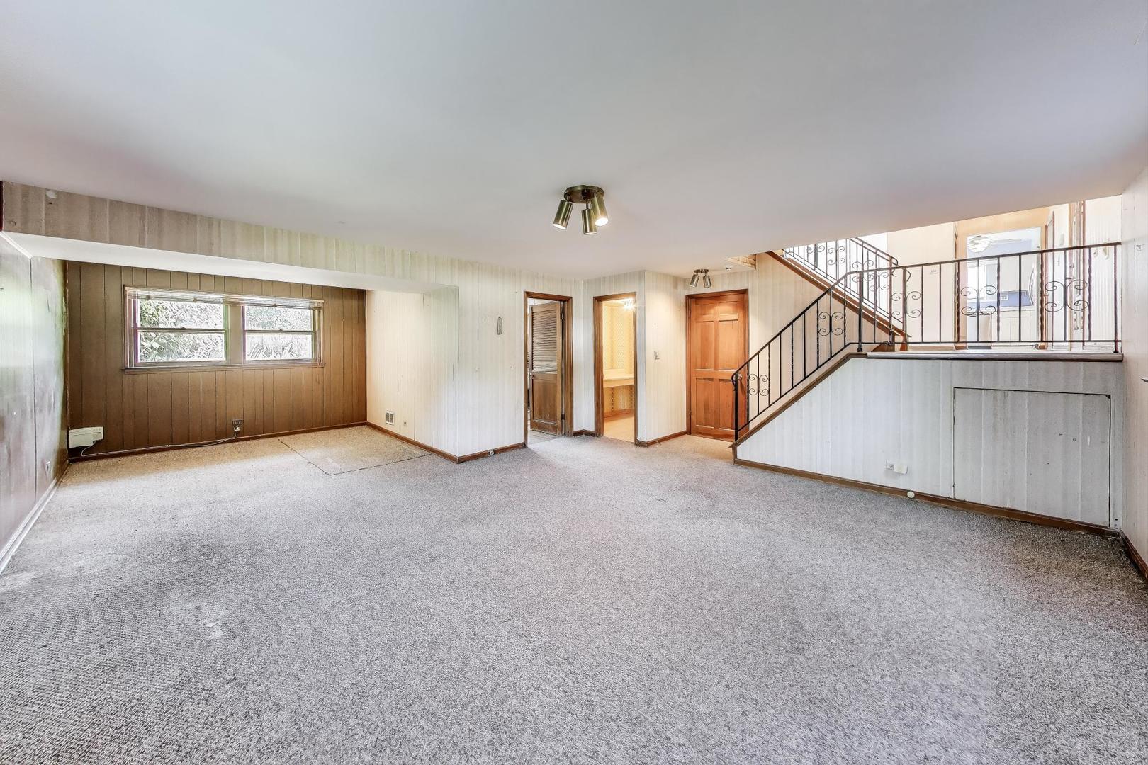 3509 Lawson Road Glenview, IL 60026 - Photo 14 of 54 a view of an empty room with a window
