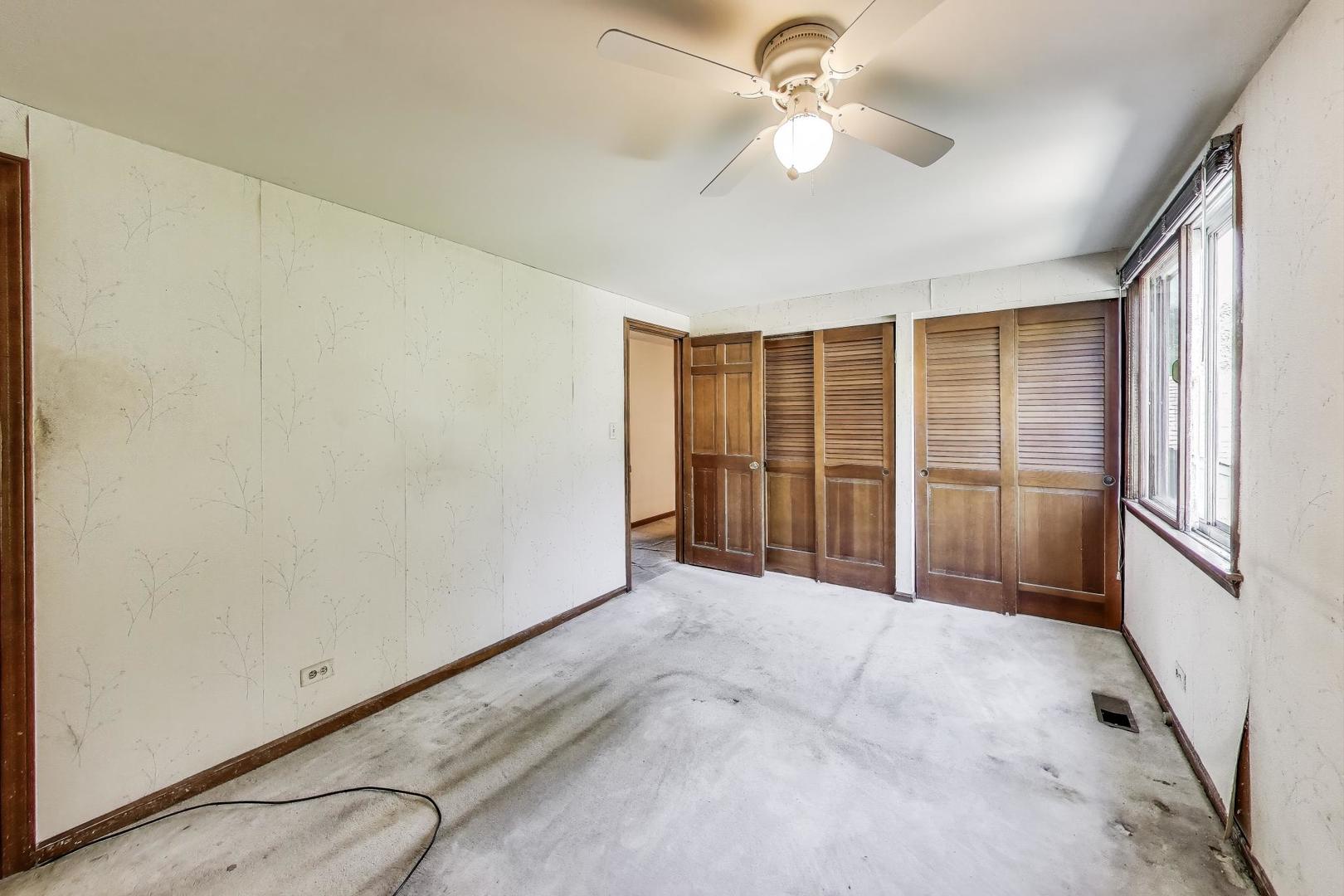 3509 Lawson Road Glenview, IL 60026 - Photo 18 of 54 a view of an empty room with a window