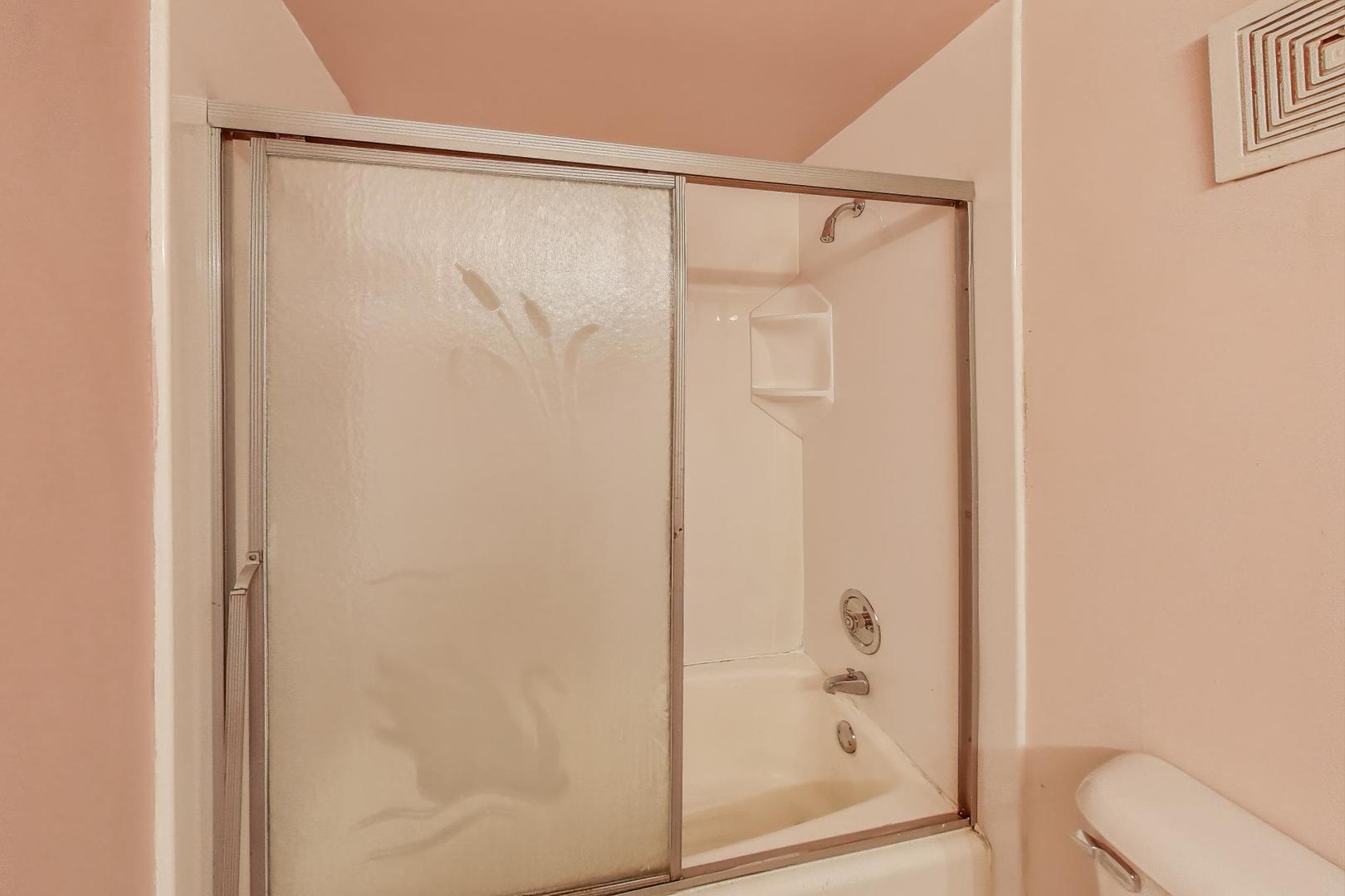 3509 Lawson Road Glenview, IL 60026 - Photo 24 of 54 a bathroom with a shower and a toilet