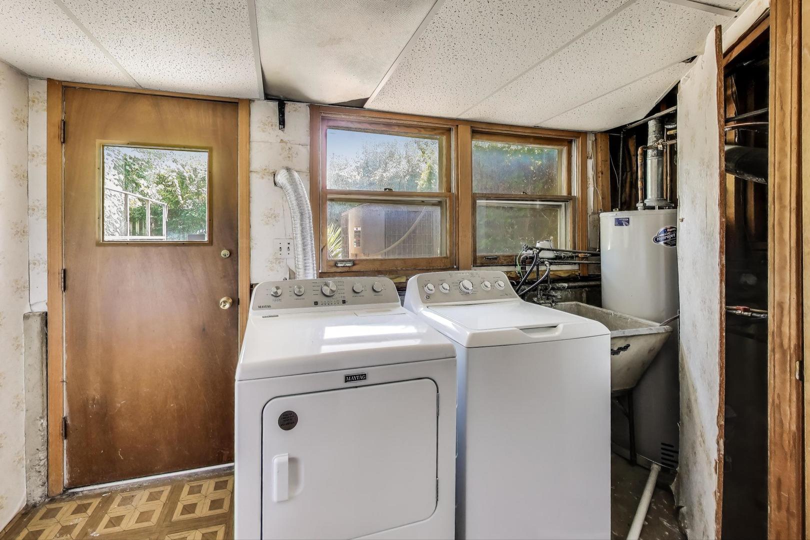 3509 Lawson Road Glenview, IL 60026 - Photo 27 of 54 a utility room with dryer and washer