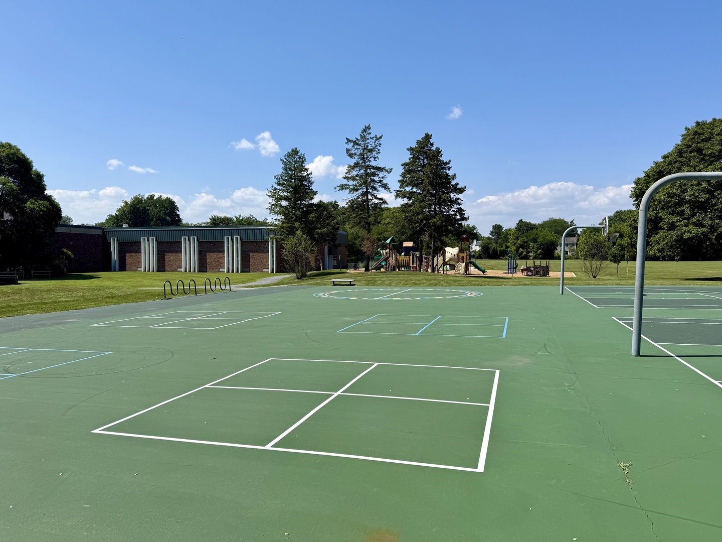3509 Lawson Road Glenview, IL 60026 - Photo 46 of 54 a view of a tennis ground with large trees