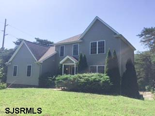 22 Stagecoach Road Marmora, NJ 08223 - Photo 1 of 1 a front view of a house with a yard