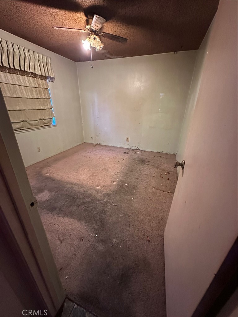 262 North Larch Avenue Rialto, CA 92376 - Photo 11 of 13 en empty room with windows