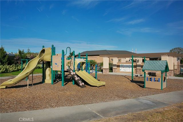 a view of a garden and basketball court