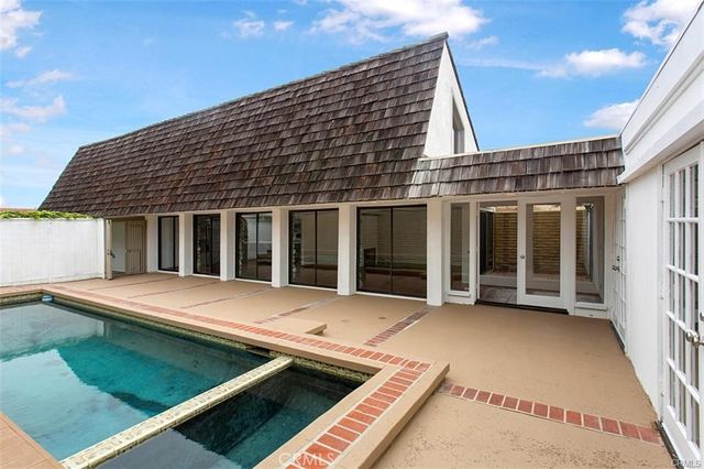 a view of a house with roof deck