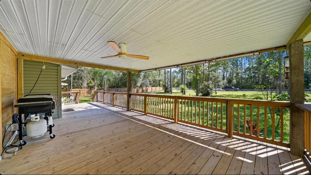 a view of a balcony with chairs