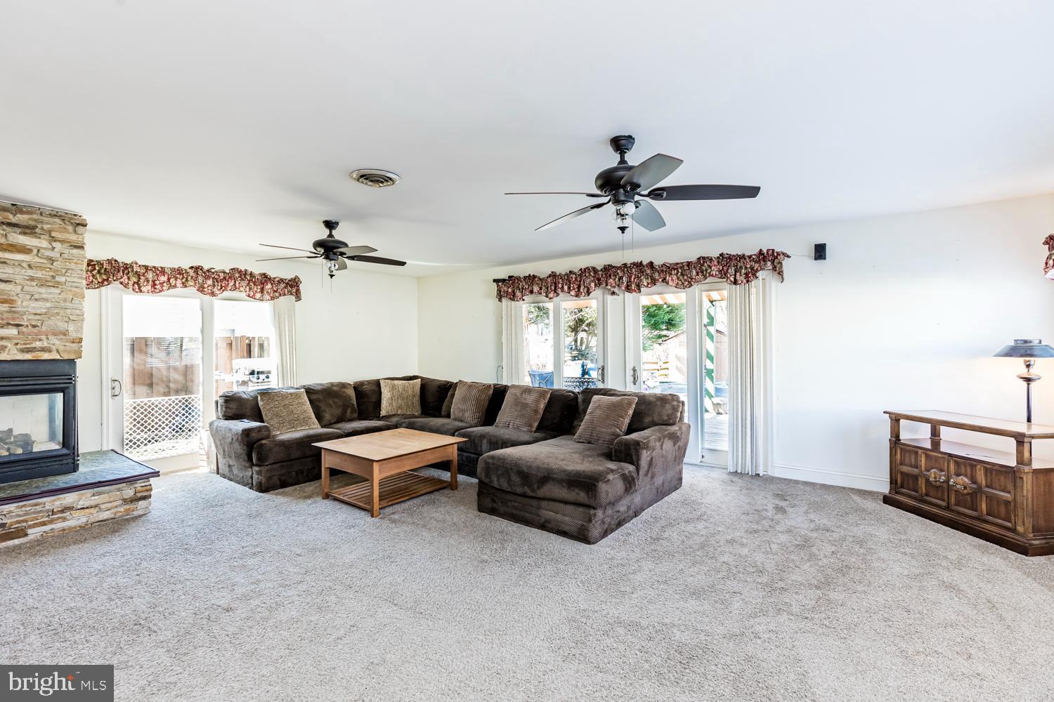10516 Scaggsville Road Laurel, MD 20723 - Photo 28 of 68 Large family room with two sliding doors to deck