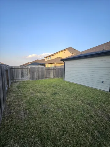a front view of a house with yard