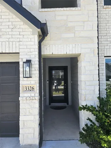 a large kitchen with kitchen island a stove a sink a table and chairs