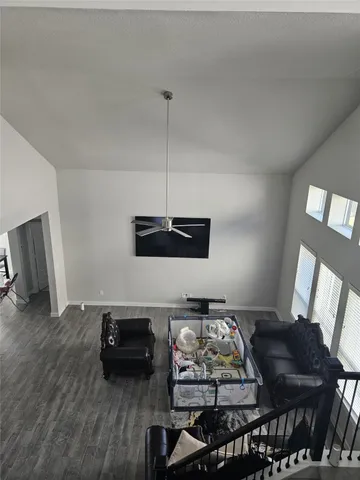 a kitchen with a dining table chairs and kitchen view