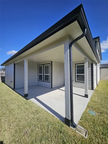 a view of a house with a big yard