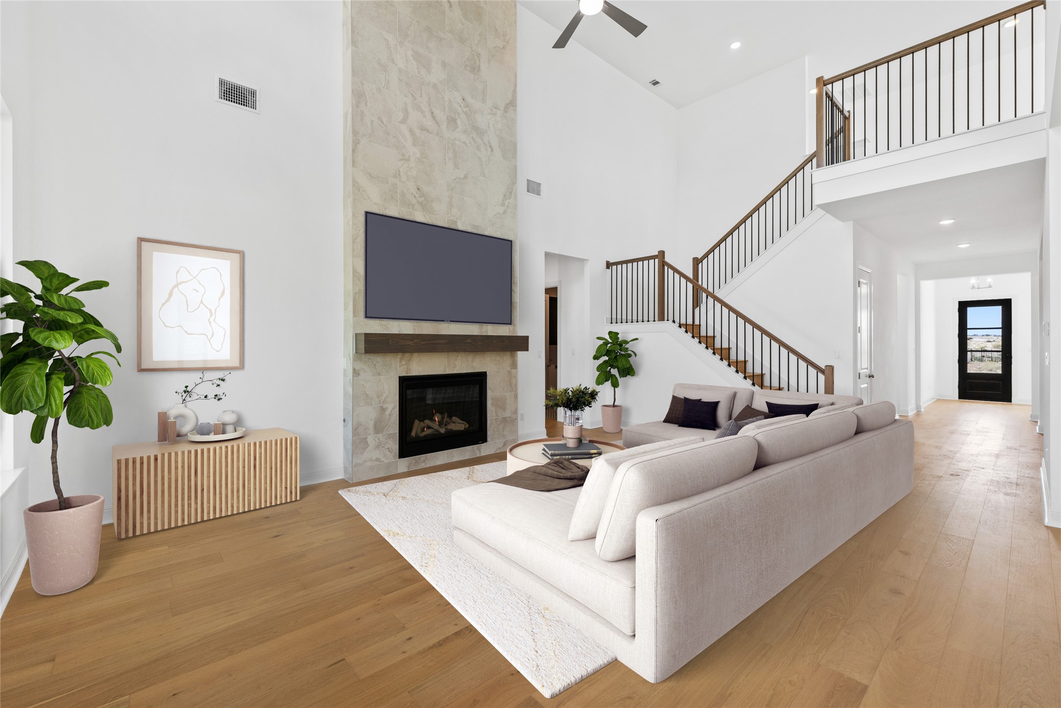 a living room with furniture and a fireplace