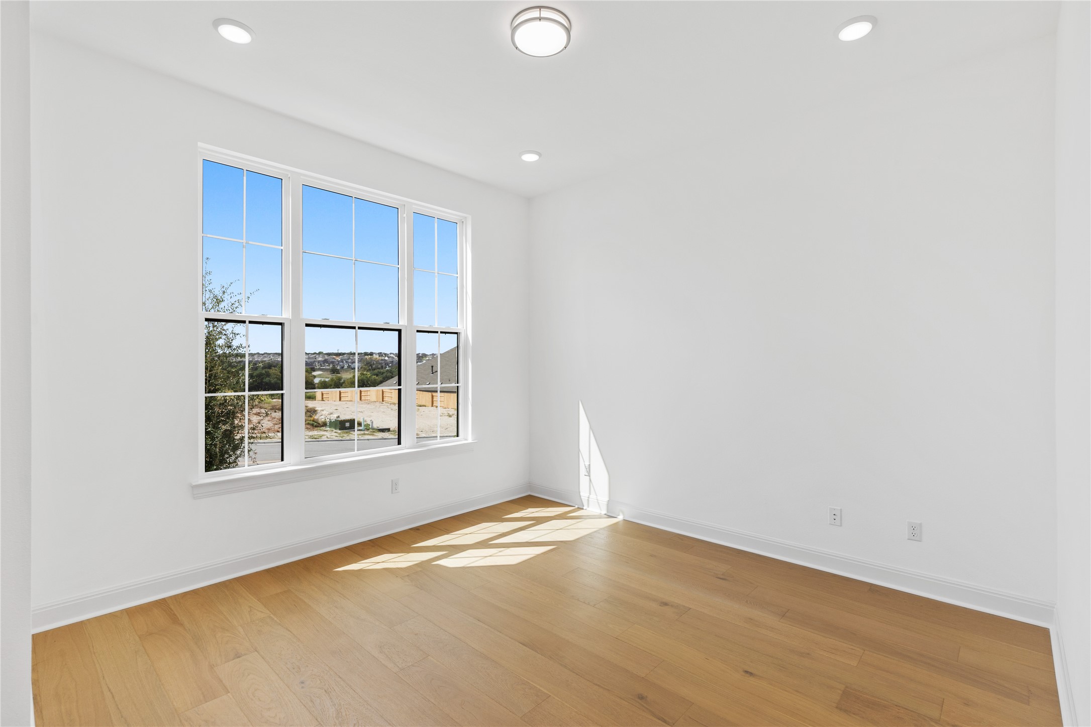 905 South Hemingway Loop Liberty Hill, TX 78642 - Photo 17 of 35 an empty room with a window