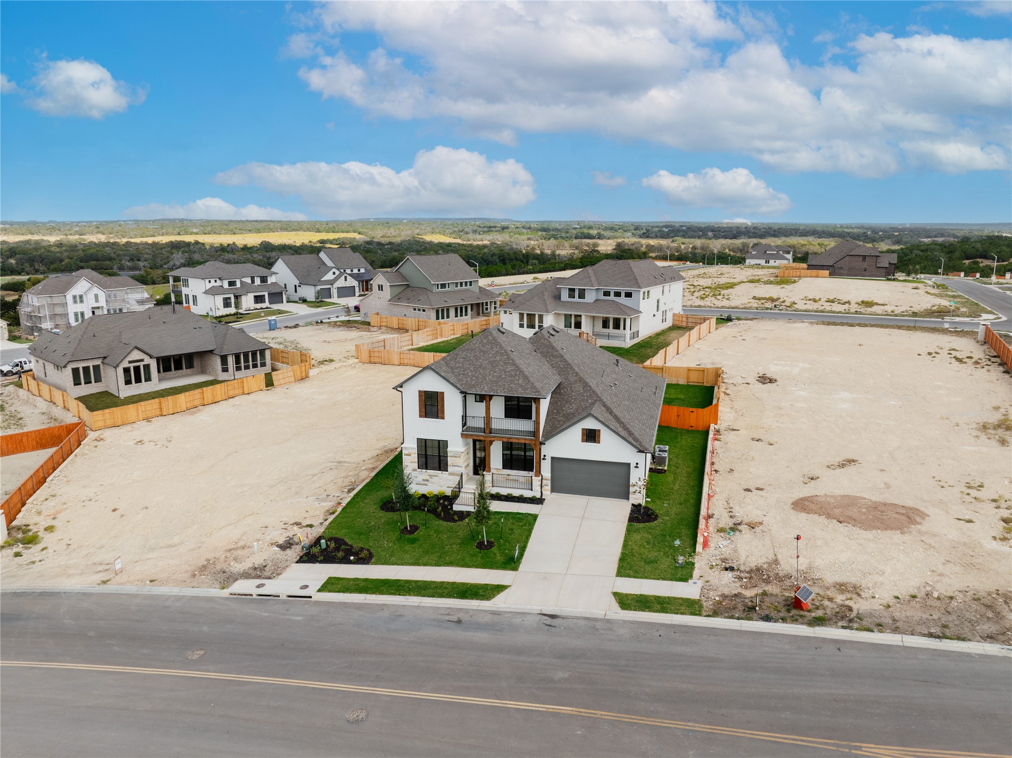 905 South Hemingway Loop Liberty Hill, TX 78642 - Photo 6 of 35 an aerial view of a house with a ocean view