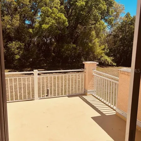 a bathroom with a granite countertop sink a toilet and bathtub