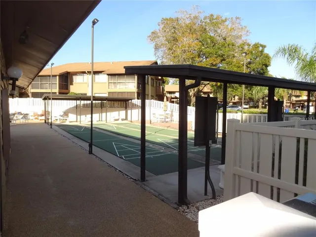 a porch with a table in balcony
