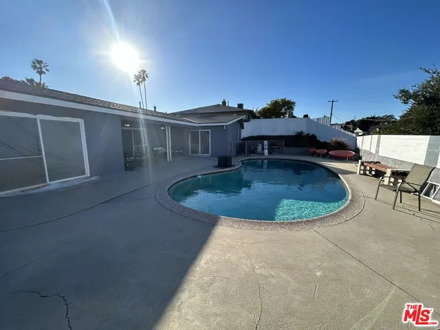 a view of a house with swimming pool