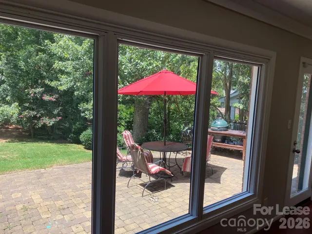 a view of a porch and a yard