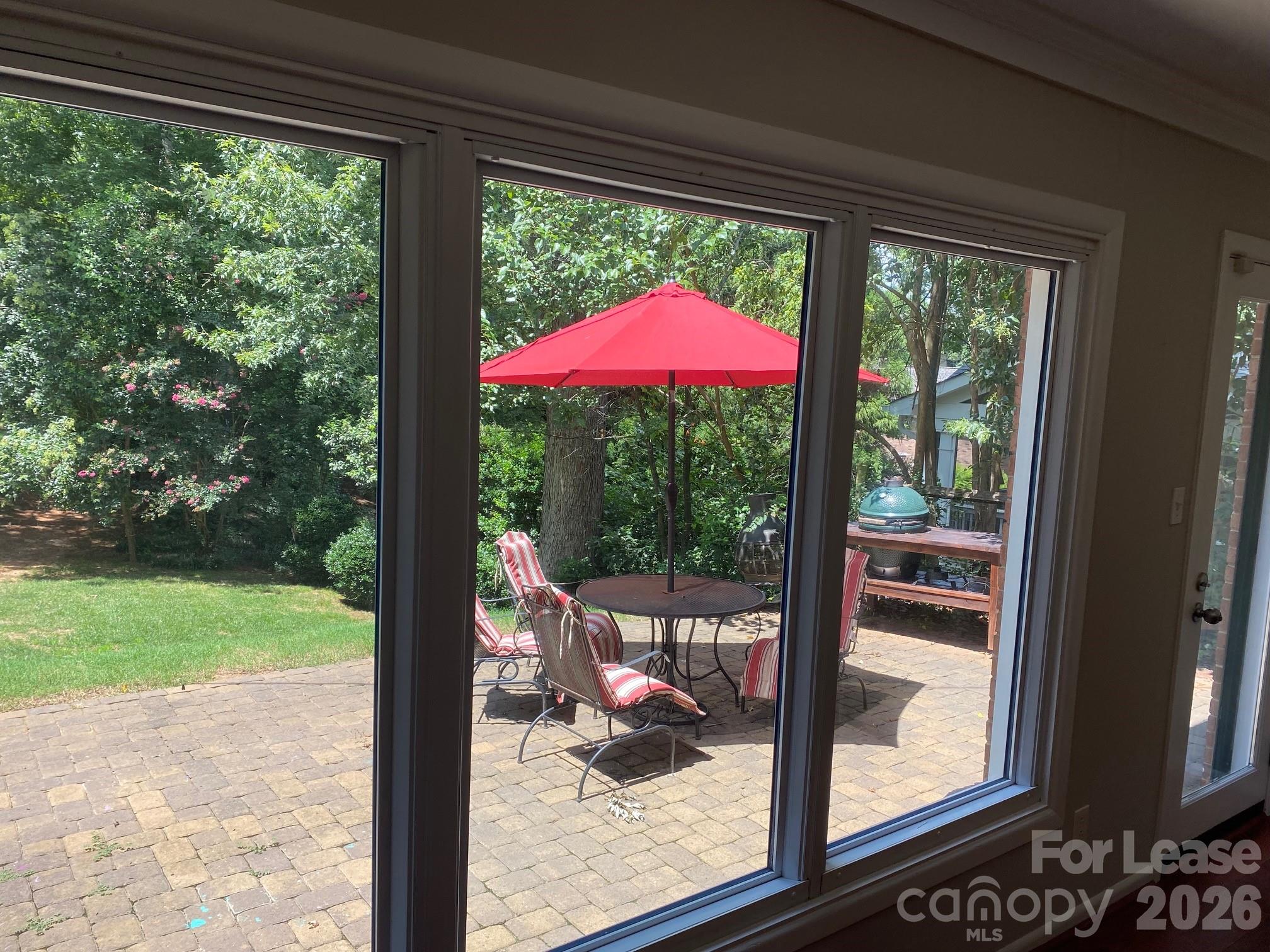 3922 Fellsway Road Charlotte, NC 28209 - Photo 13 of 31 a view of a porch and a yard