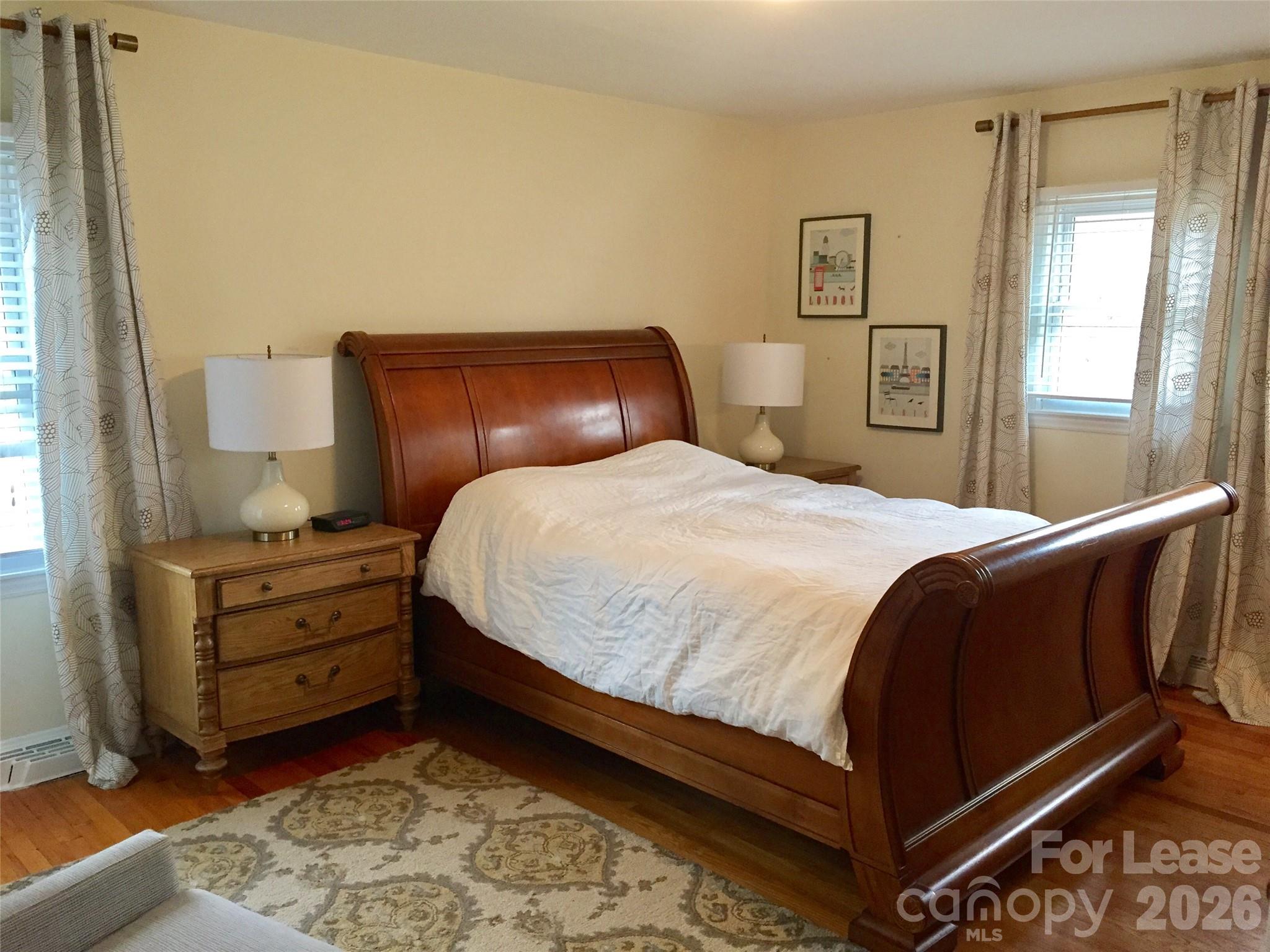 3922 Fellsway Road Charlotte, NC 28209 - Photo 24 of 31 a bedroom with a bed and window