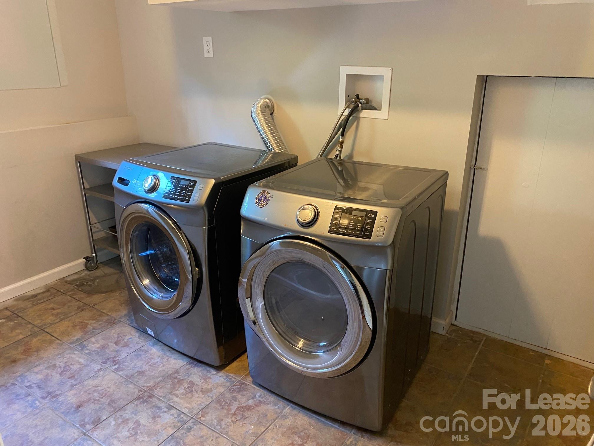 3922 Fellsway Road Charlotte, NC 28209 - Photo 31 of 31 a utility room with dryer and washer