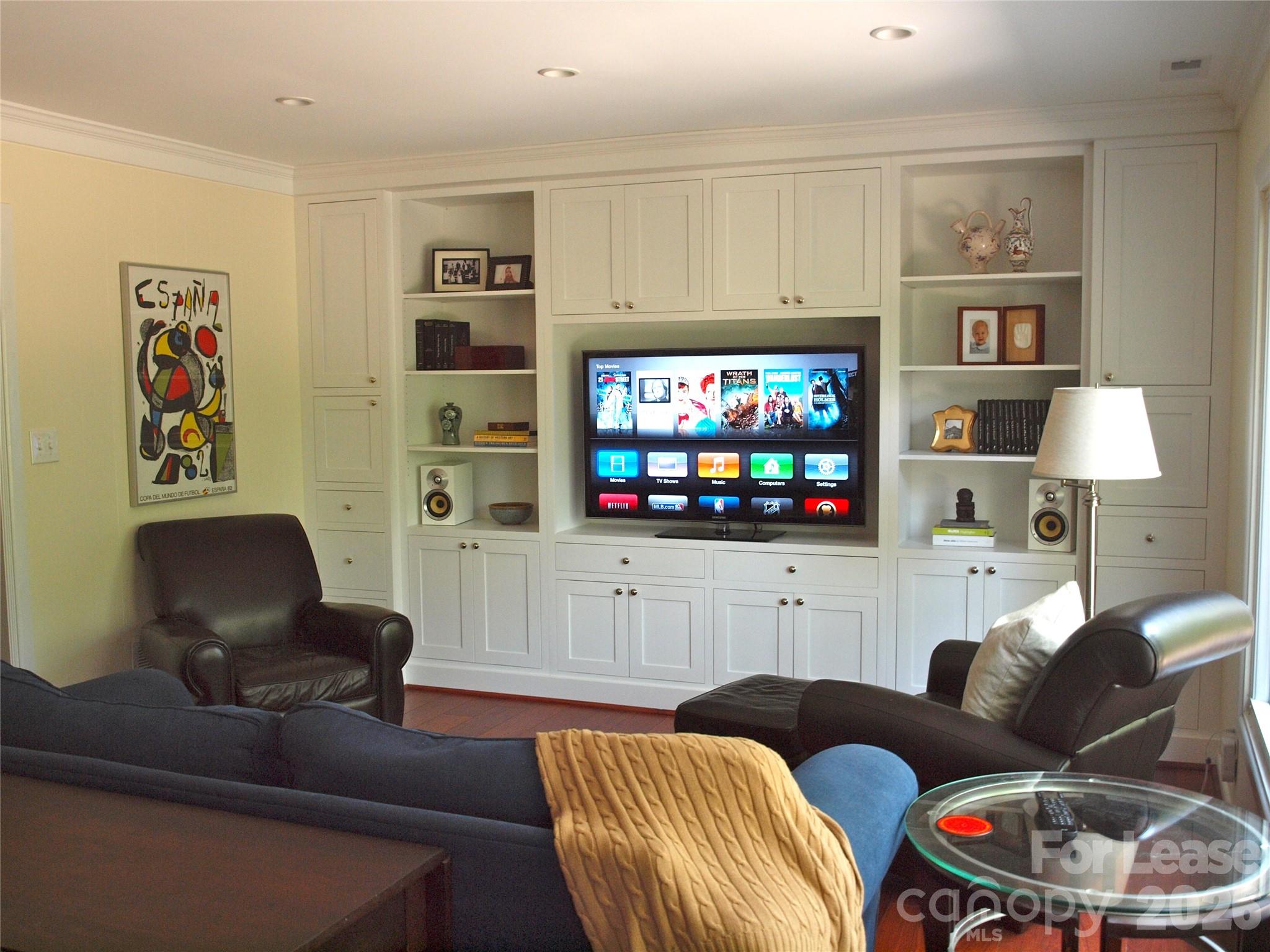3922 Fellsway Road Charlotte, NC 28209 - Photo 9 of 31 a living room with furniture and a flat screen tv