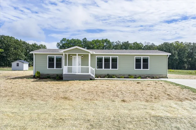 front view of house with a yard