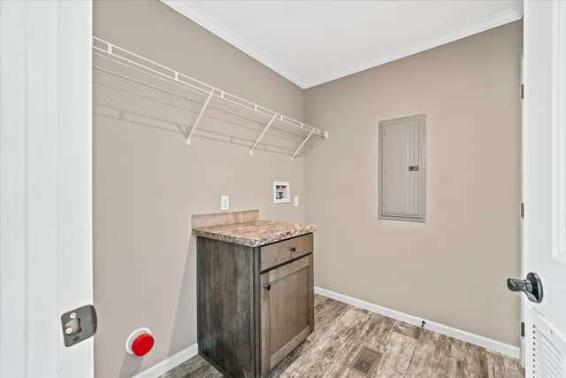 a view of storage and utility room with washer and dryer