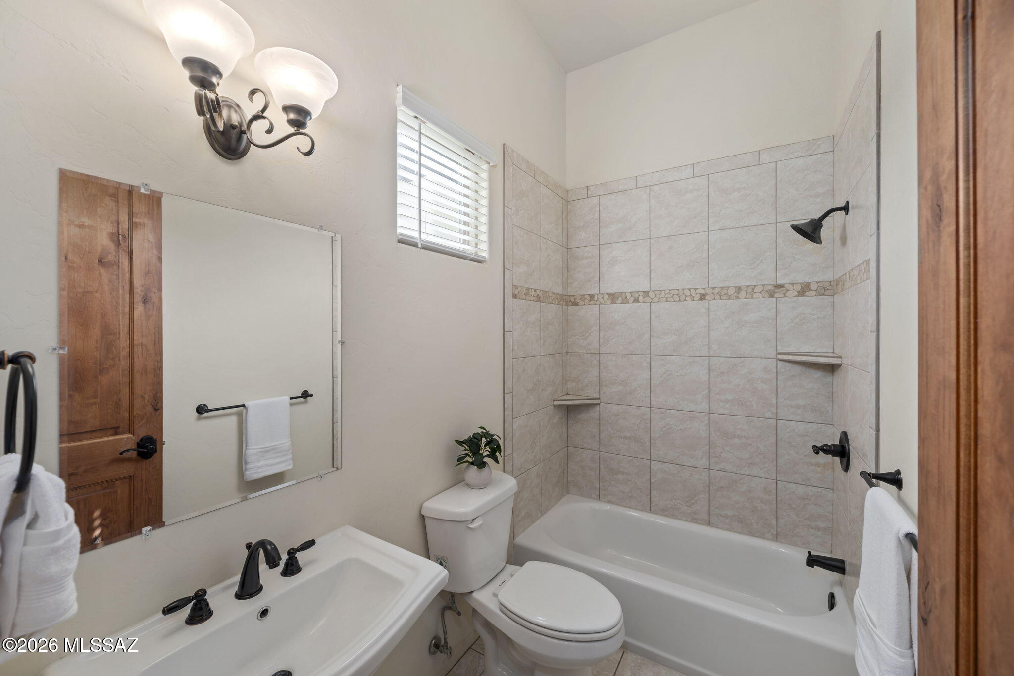 45 High View Court Tubac, AZ 85646 - Photo 37 of 44 a bathroom with a sink a toilet and shower