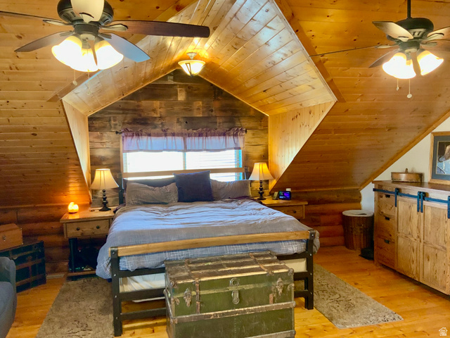 76 Highway 118 Monroe, UT 84754 - Photo 34 of 76 Bedroom with ceiling fan, wooden ceiling, light wood finished floors, wood walls, and vaulted ceiling