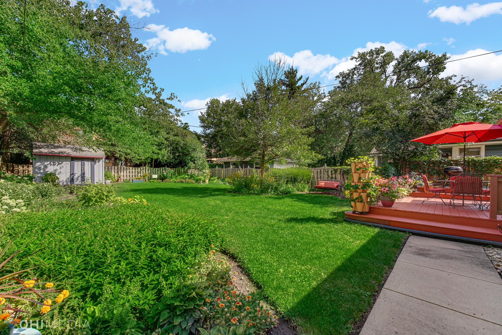 17911 Riedle Court Homewood, IL 60430 - Photo 21 of 23 a view of a house with backyard and sitting area