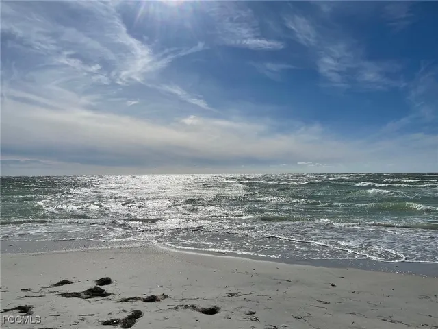 a front view of a house with lake view