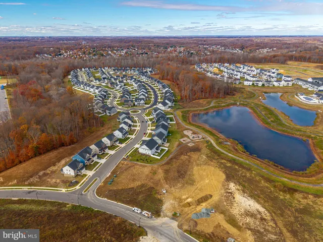 an aerial view of residential building with parking space