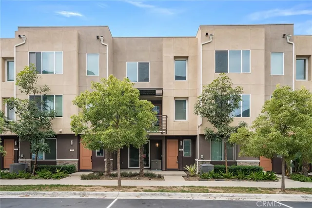a front view of a multi story residential apartment building
