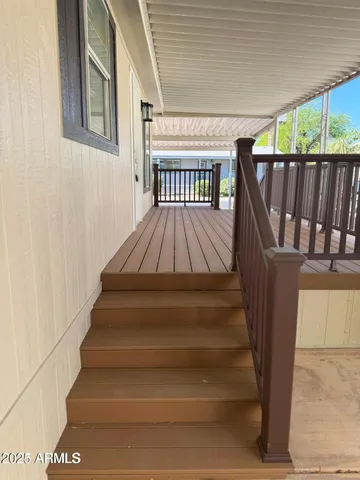 a view of outdoor space with signage and flags