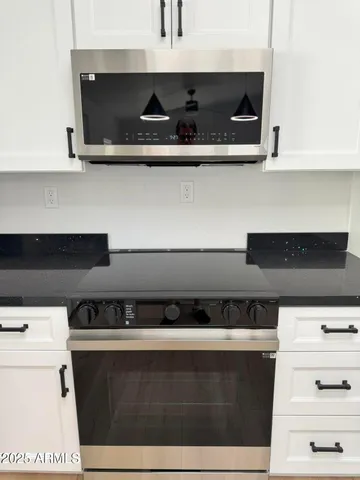 a close view of shoes stand and cabinets