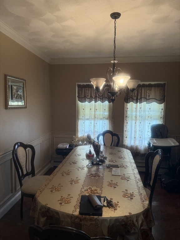 82 2nd Street Medford, MA 02155 - Photo 12 of 38 a view of a dining room with furniture and window