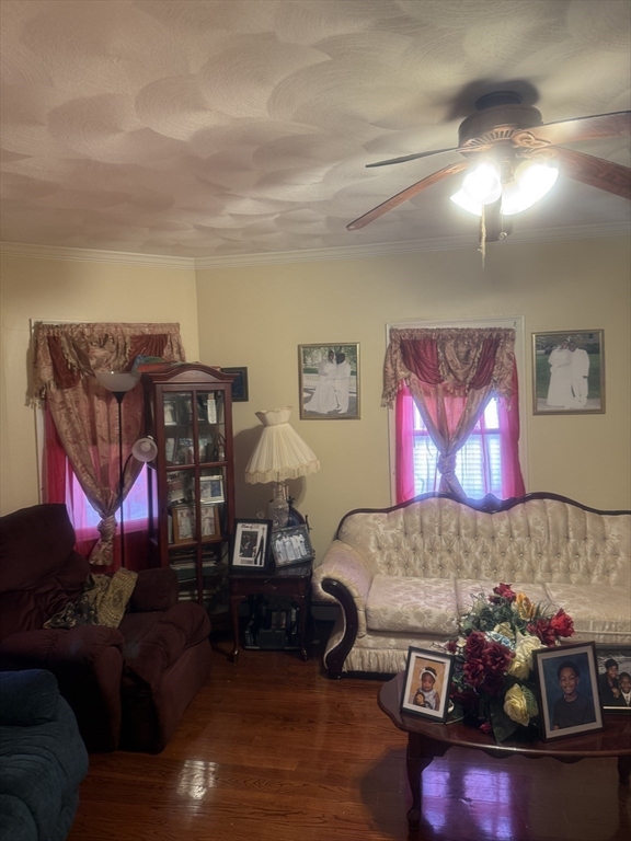 82 2nd Street Medford, MA 02155 - Photo 16 of 38 a living room with furniture and a couch