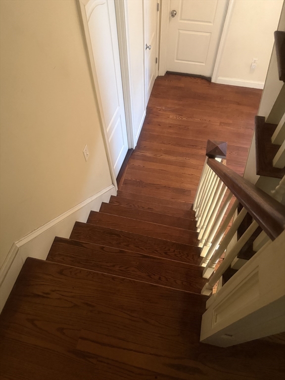 82 2nd Street Medford, MA 02155 - Photo 17 of 38 a view of entryway with wooden floor