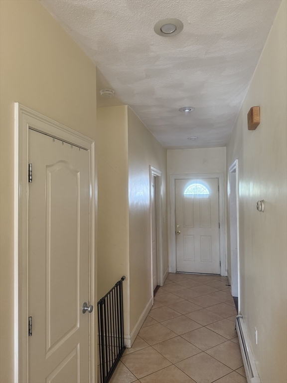 82 2nd Street Medford, MA 02155 - Photo 32 of 38 a view of a hallway