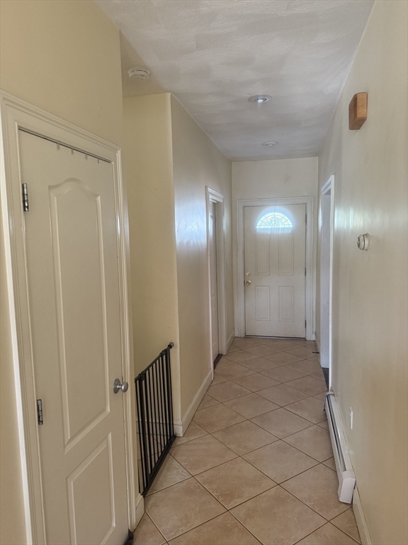 82 2nd Street Medford, MA 02155 - Photo 33 of 38 a view of a hallway
