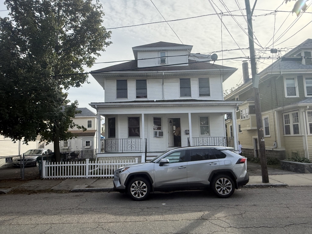 82 2nd Street Medford, MA 02155 - Photo 36 of 38 a car parked in front of a house