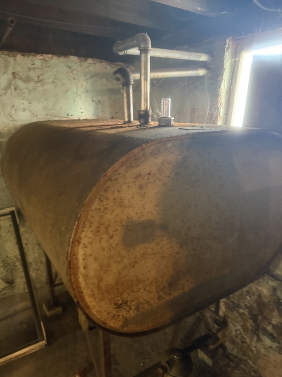 82 2nd Street Medford, MA 02155 - Photo 5 of 38 a view of a fireplace in a room