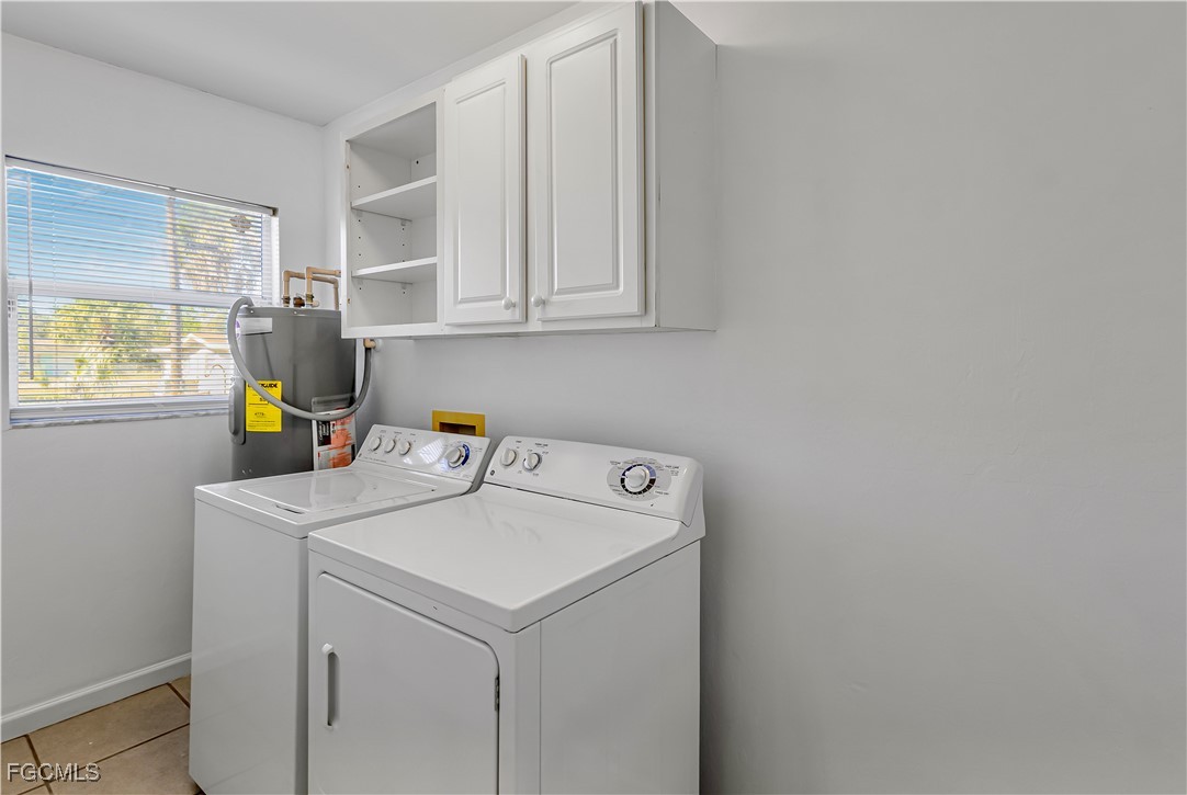 2301 Hibiscus Road Fort Myers, FL 33905 - Photo 11 of 40 a utility room with dryer and washer