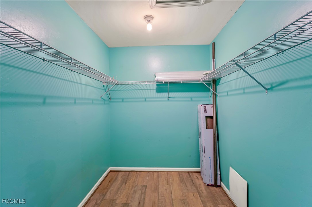 2301 Hibiscus Road Fort Myers, FL 33905 - Photo 29 of 40 a view of a room with wooden floor