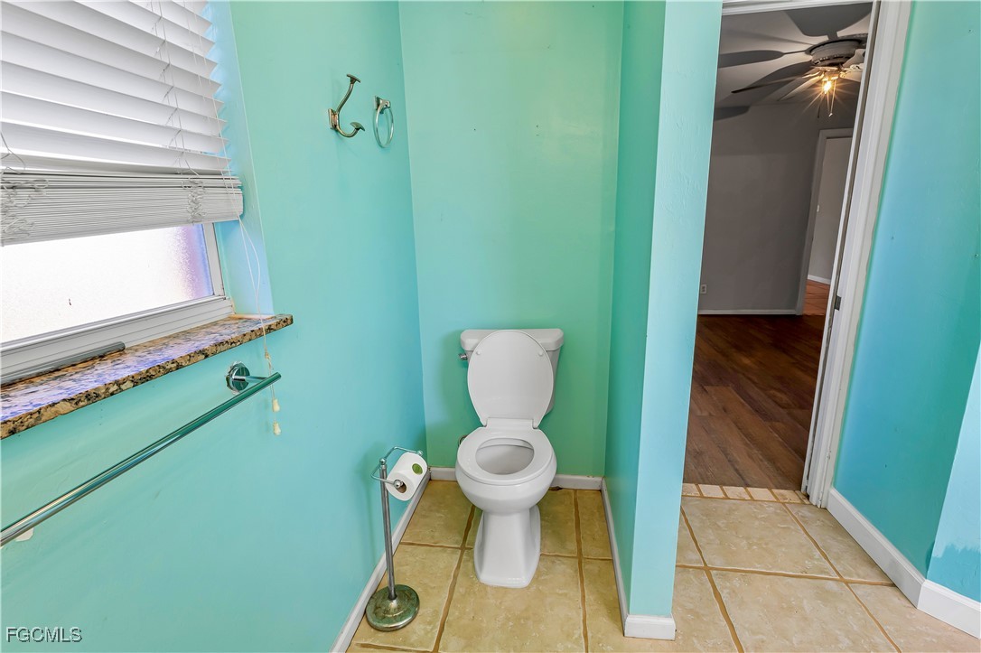 2301 Hibiscus Road Fort Myers, FL 33905 - Photo 33 of 40 a bathroom with a toilet and a sink