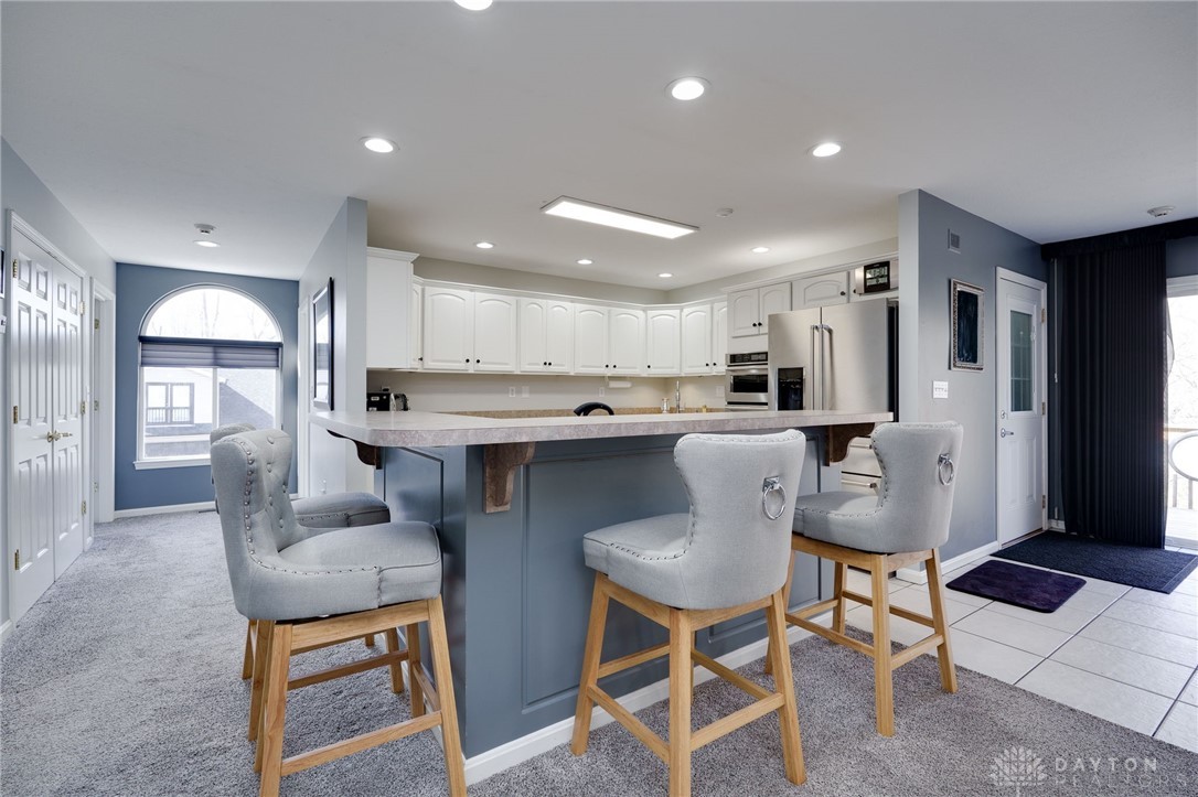 3535 Waynesville Road Bellbrook, OH 45305 - Photo 10 of 65 Entertaining is so easy here with this wonderfully open kitchen and island that offers so much counter and cabinet space!